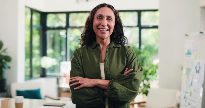 Arms crossed, face and smile of designer woman in office for management of company or planning. About us, confidence and creative with happy mature employee in design workplace for job satisfaction