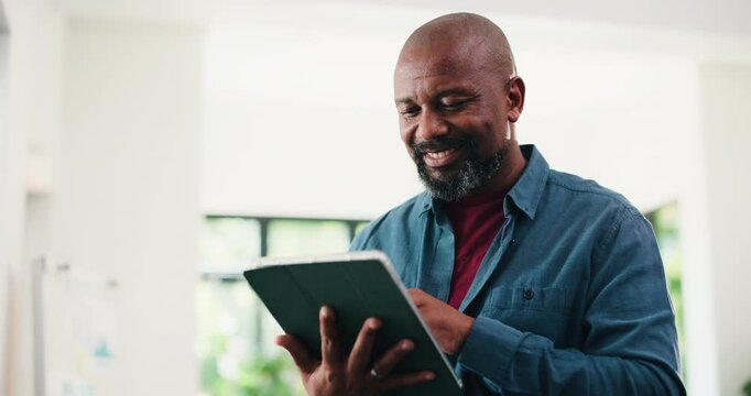 Creative, black man and smile with tablet in office for research, proofreading and update draft. Mature person, digital and editor feedback on article, story submission and information on publication