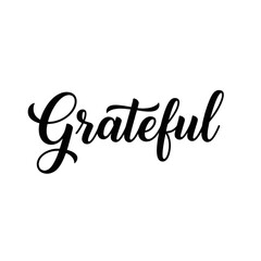 White outline of the word Grateful in cursive on black background thank you appreciation