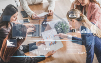 A diverse business team engages in a detailed analysis of financial data and graphs, promoting collaboration and strategic decision-making in a modern workspace environment. Scalp