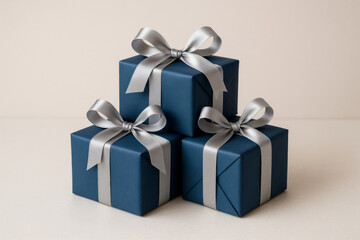 Obraz premium Gifts in blue wrap and silver ribbon stacking