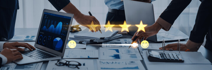 A diverse business team collaborates in a modern office, analyzing performance data through charts and graphs to enhance productivity and reach goals effectively. Trope