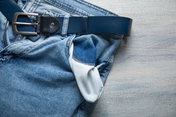 Empty jeans pocket. No money. Crisis