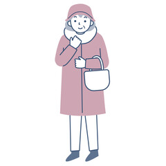 冬のコートを着たシニア女性