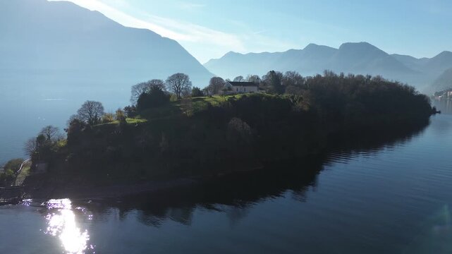 View of Comacina island from the village of Ossuccio on Lake Como