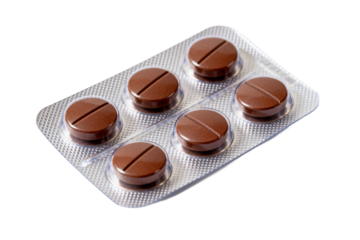Blister pack containing brown round tablets for medicinal use