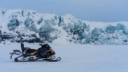 Svalbard. Snowmobile in sea ice close to the glacier front