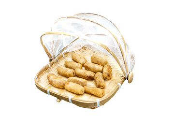 Top view of Dried bananas in Bamboo basket to prevent cattle fly, focus selective