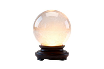 A transparent crystal ball placed on a dark wooden base