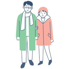 冬のコートを着たカップル