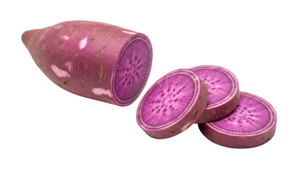 Whole purple sweet potato cut into slices on white background root vegetable sliced