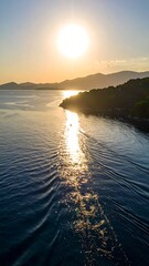 Sunrise over tranquil bay