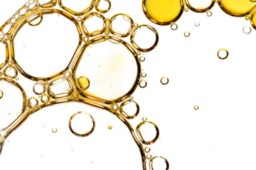 Close-up view of golden oil bubbles with different sizes