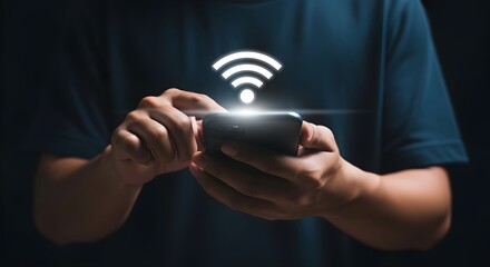 Seamless digital connection: person holding smartphone with glowing Wi-Fi icon, accessing network.