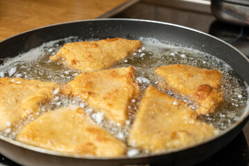 Crispy breaded cheese in the pan