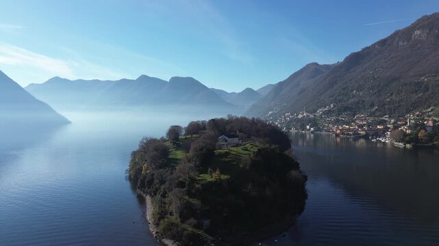 View of Comacina island from the village of Ossuccio on Lake Como