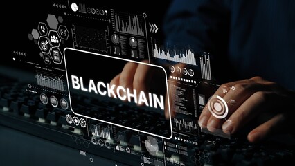 Focused Individual Typing on Keyboard with Overlay of Blockchain Technology Graphics and Data Visualization Elements. Asymptotic smart data analytic.