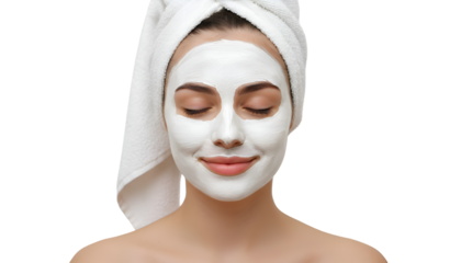 Relaxed Young Woman with Facial Mask and Hair Towel During Beauty Skincare Routine on white background