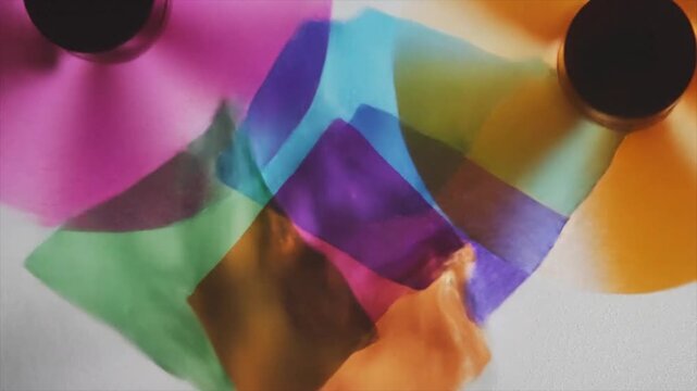 Colorful Paper and Ink Bottles for Artistic Creativity.