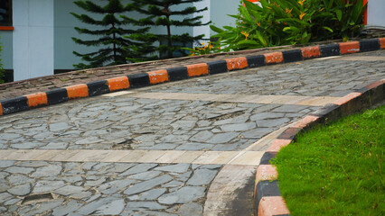 Curved Stone Pathway with Painted Roadside Curbs
