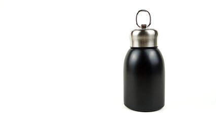 Small matte black water bottle or thermos with a metal cap, isolated on white