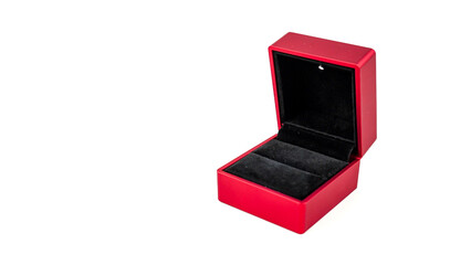 Open red velvet ring box with black interior, empty and isolated on a white background