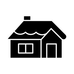 Snowy cabin in forest