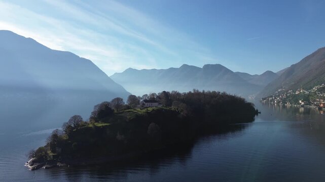 View of Comacina island from the village of Ossuccio on Lake Como
