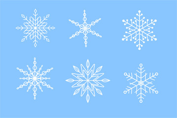 Set of unique white snowflakes on a light blue background. 