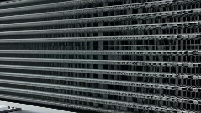 Medium view of a titanium heat exchanger highlighting advanced thermal conductivity and lightweight design enhancing geothermal energy conversion.