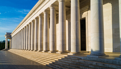 Fototapeta premium Neoclassical Marble Columns And Wide Stone Steps At Sunset