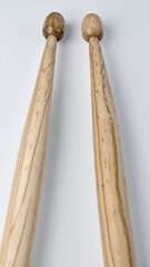 Two drum sticks, light wood grain