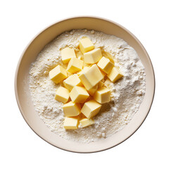 Cubed butter and flour mixing in bowl for baking