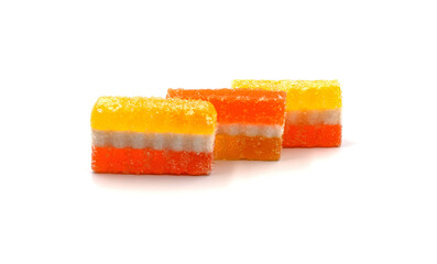 Сolorful layered sugar-coated gummy candies on a white background 