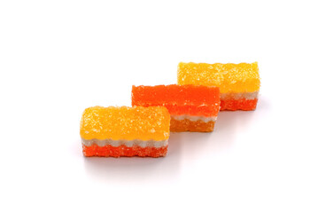 Сolorful layered sugar-coated gummy candies on a white background 