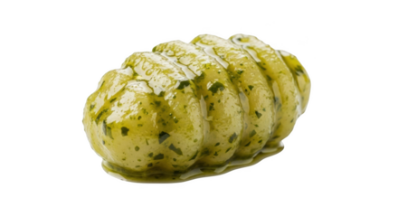 Yellowish green herb butter with visible parsley flecks