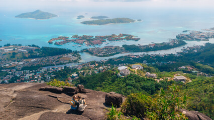 beautiful young couple on the mountain kissing on the background of the ocean copolia trail © Ivan
