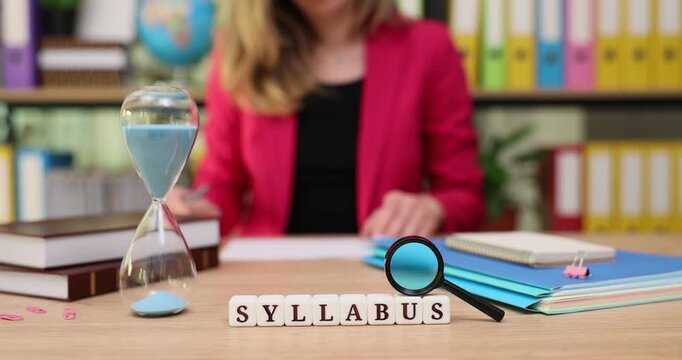 Focused student reviews syllabus and prepares for upcoming exams in a bright and colorful study space