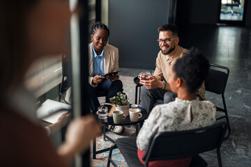 Professional Team Engaged in Discussion in Modern Office Setting
