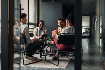 Diverse Team Engaged in a Collaborative Business Meeting Discussion