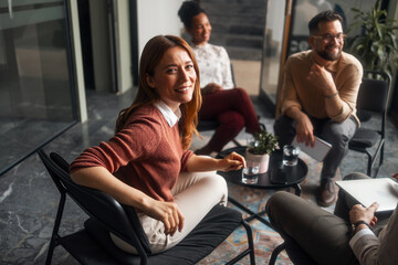 Group of Individuals Collaborating in a Casual Meeting Setting