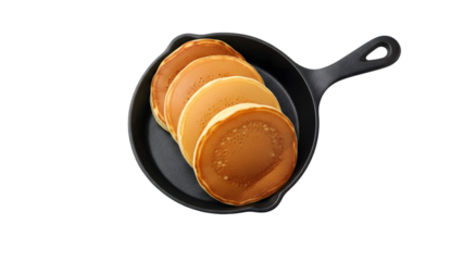 Stack of pancakes in a cast iron skillet isolated on transparent background