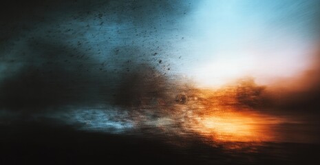 Fototapeta premium Abstract blurred sky dark clouds meet warm sunset tones