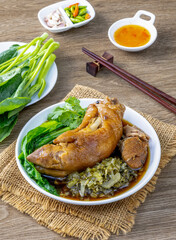 Halogen pig's feet set out to eat