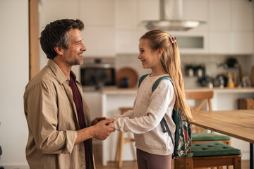 Father and Daughter Connecting in a Modern Home Kitchen Scene