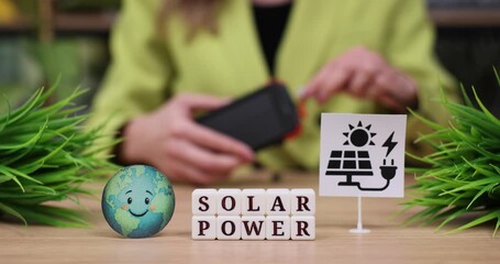 Exploring sustainable energy solutions with solar power symbols and a vibrant globe