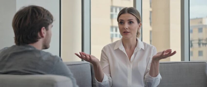 Therapist and Patient Communication: A caring therapist offers a patient supportive counsel in a serene setting, fostering trust. Emphasizing the significance of empathy and mental health well-being