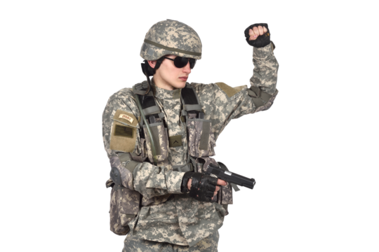 A soldier in full gear with a pistol in his hands raised his left hand up - Powered by Adobe