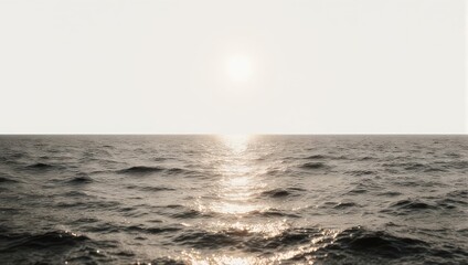 Sunlight dancing on the oceans surface, creating a shimmering path of light.