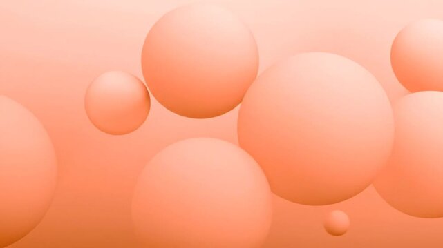 A collection of softly lit, peach-colored spheres float against a gradient peach background